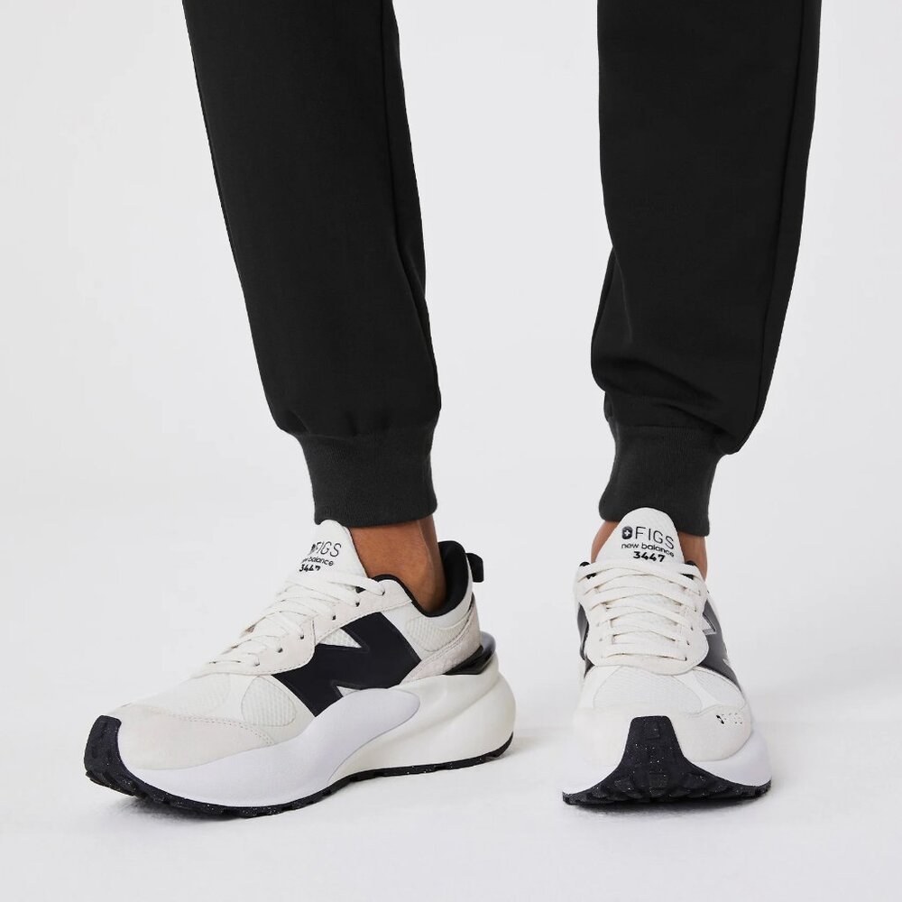 New Balance Women's Cream and Black Sneakers